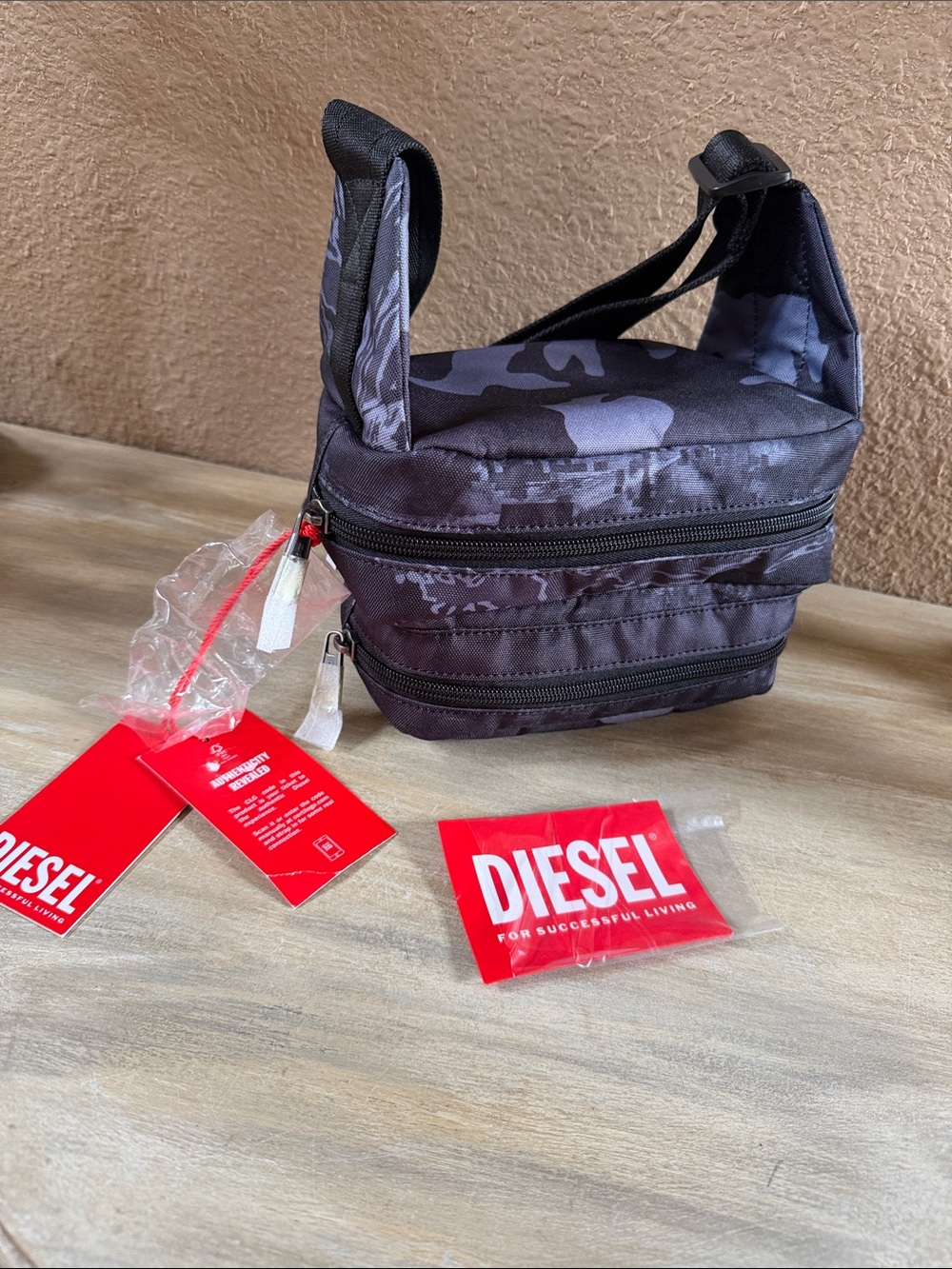 Diesel waist bag . Adjustable . Dbl compartment Navy Camo. NEW with tags